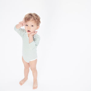 Baby Mori sage bodysuit made from sustainably sourced, natural materials that are thermoregulating.